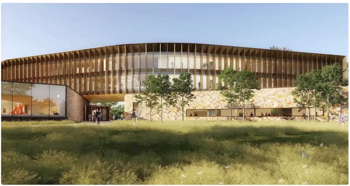 Rendering of a curved timber-and-stone academic building above a meadow on a Bentonville, Arkansas campus