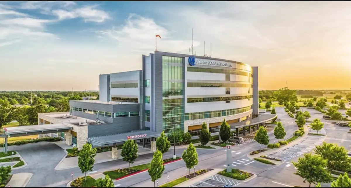 Aerial view of Arkansas Children's Northwest hospital campus in Springdale at sunset
