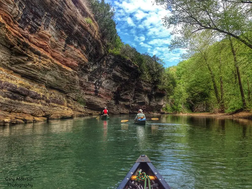 Buffalo River bluff and floaters in the Arkansas Ozarks