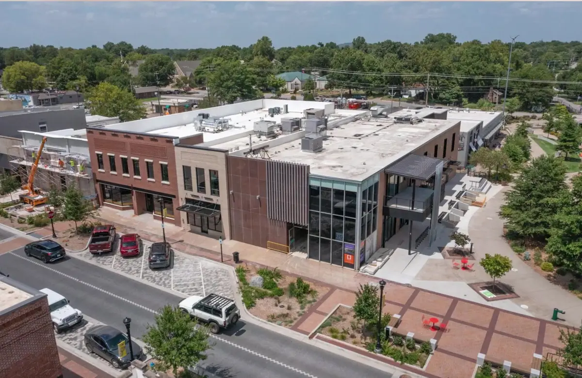 Aerial view of renovated mixed-use storefronts and streetscape along Emma Avenue in downtown Springdale, Arkansas