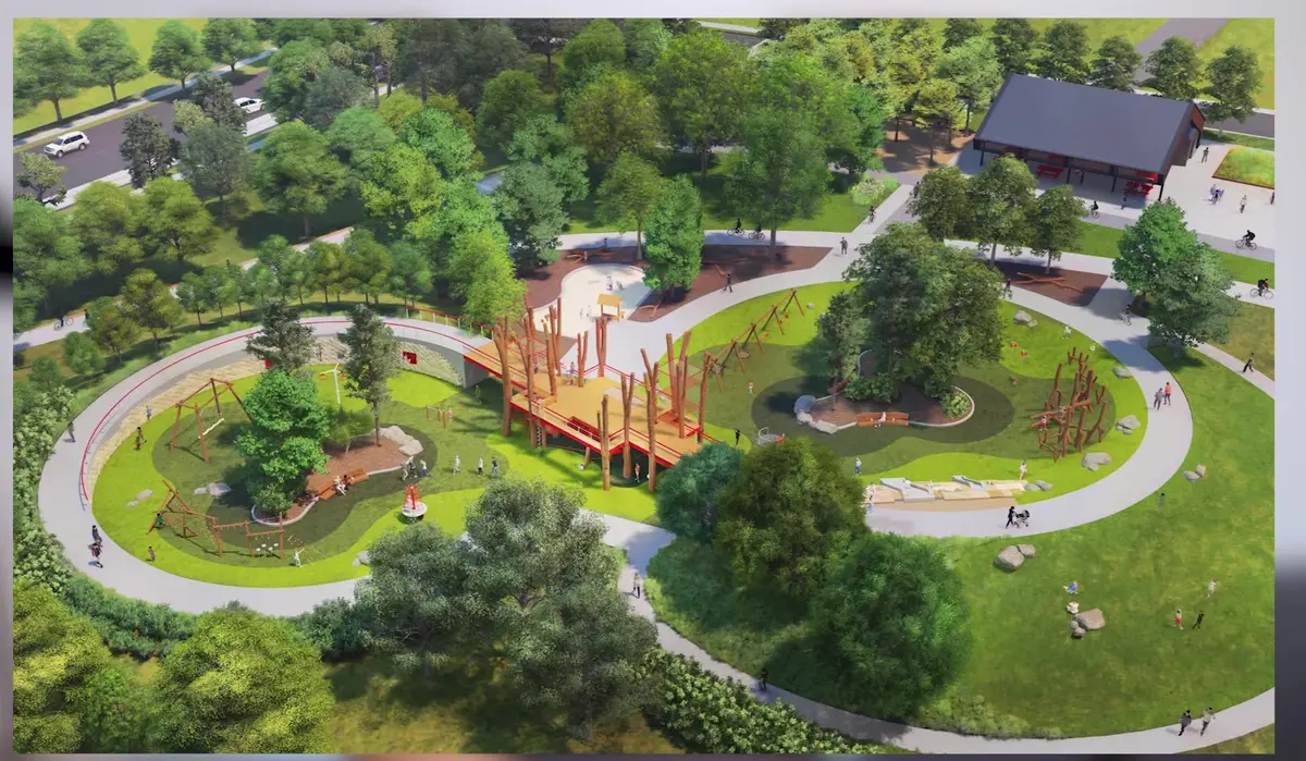 Rendering of a new Northwest Arkansas public park showing a timber play structure, looping walking paths and a pavilion