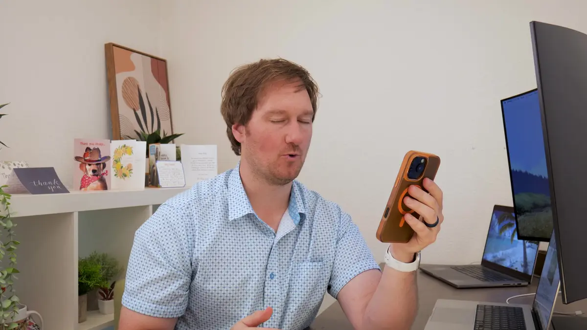 Northwest Arkansas real estate agent Phillip Shepard watching TikToks about NWA on his phone