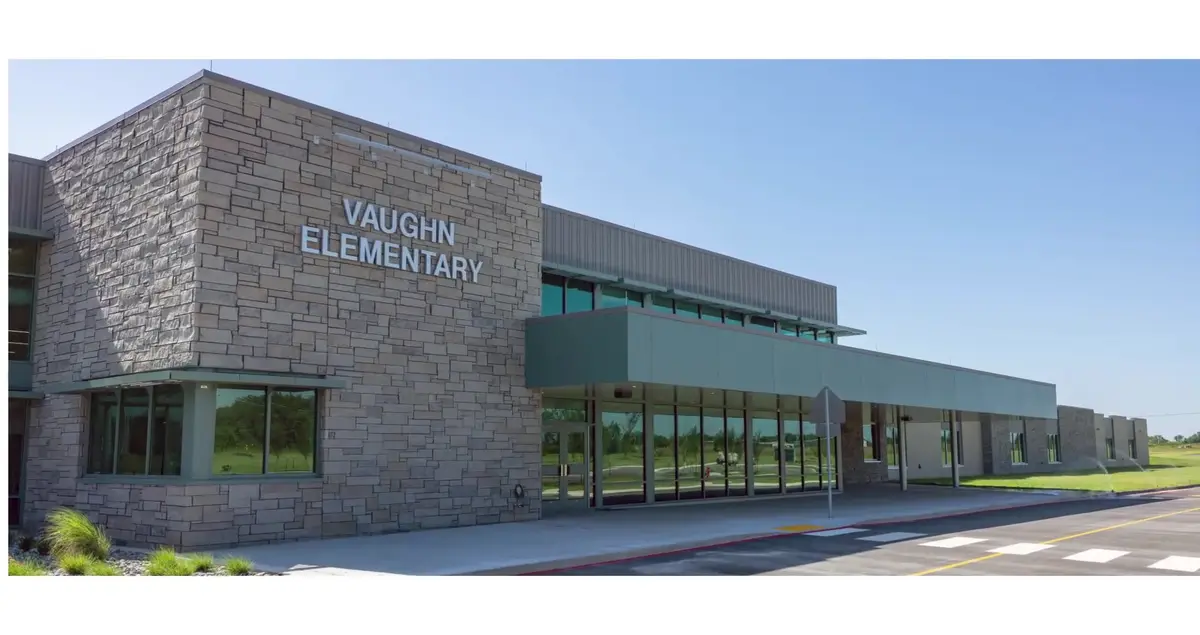 Exterior of Vaughn Elementary School, a stone and metal campus in the Bentonville school district