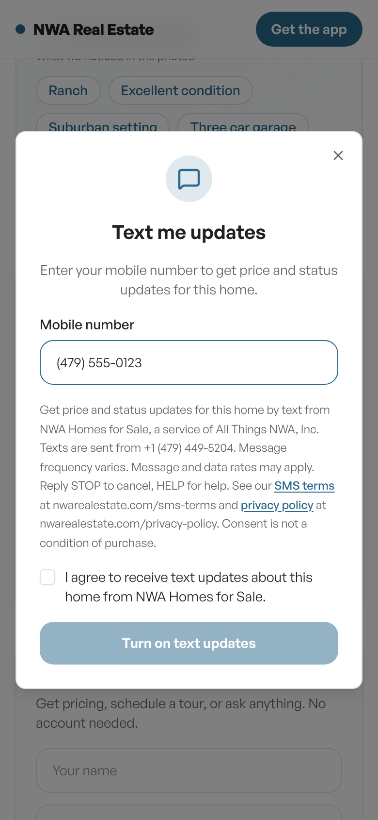 The opt-in screen on nwarealestate.com: a buyer enters their mobile number under 'Text me updates' and sees the full consent disclosure before turning on text updates.